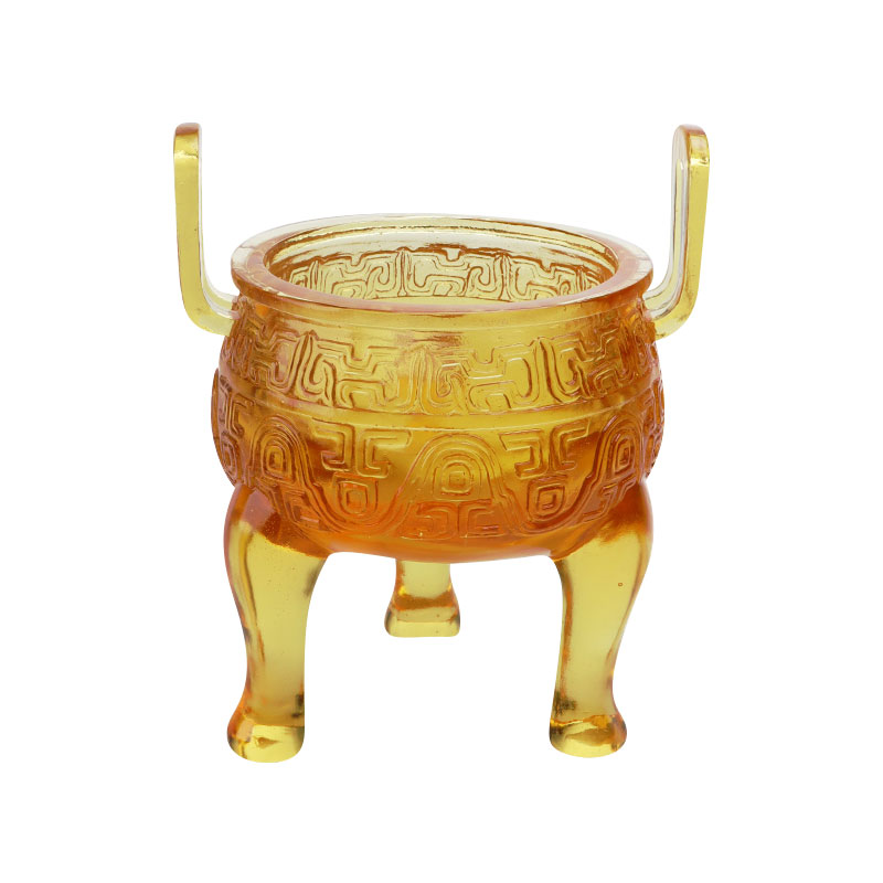 Ozdoby na trojnožku zlatej glazúry